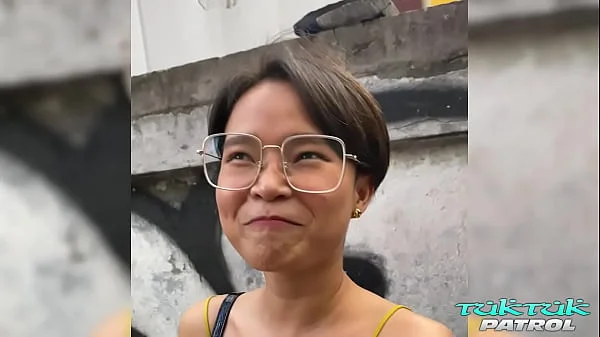 Horny Thai with short hair and glasses trying out thick white penis