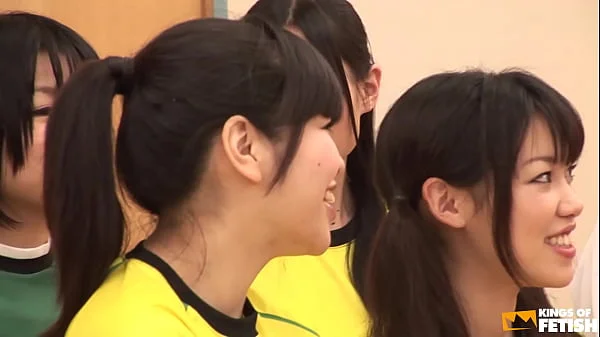 Japanese female team listen and take a lesson from their coach