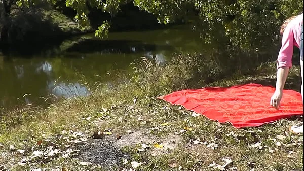 Wild beach. Nudist beach. On river bank sexy blonde Milf Frina stripped naked. Sunbathes, masturbates wet pussy with fingers, gets strong orgasm. Naked in public. Nude in public. Public nudity. Publicly. Pussy masturbation. Masturbating cunt. Fingering