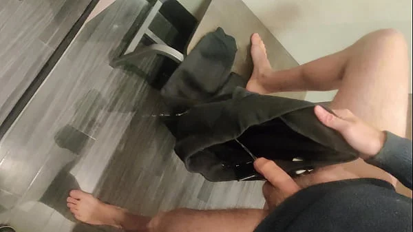 Pissing in a Fitting Room, Using a Pair of Pants