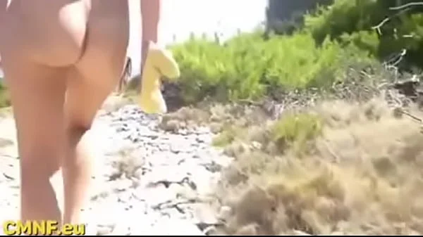 Candid nudist teen goes for a walk