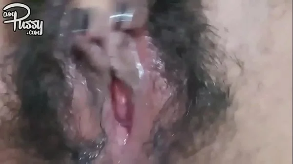 Extreme close-up hairy pussy masturbation