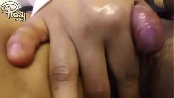 Ebony girl is rubbing her large clitoris