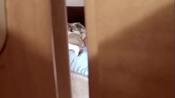 Spying behind a door a teen stepdaughter masturbating in bedroom and coming very intense