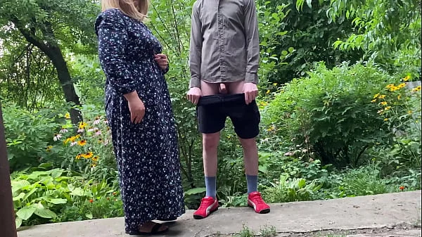 Gorgeous MILF helped a stranger pee outside and pee herself