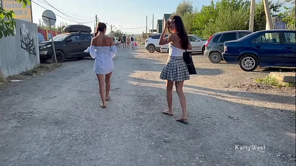 Two girls walk in public without panties and show pussies
